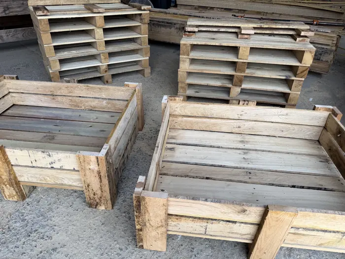 Open-top crates and bins built for repeat internal use.