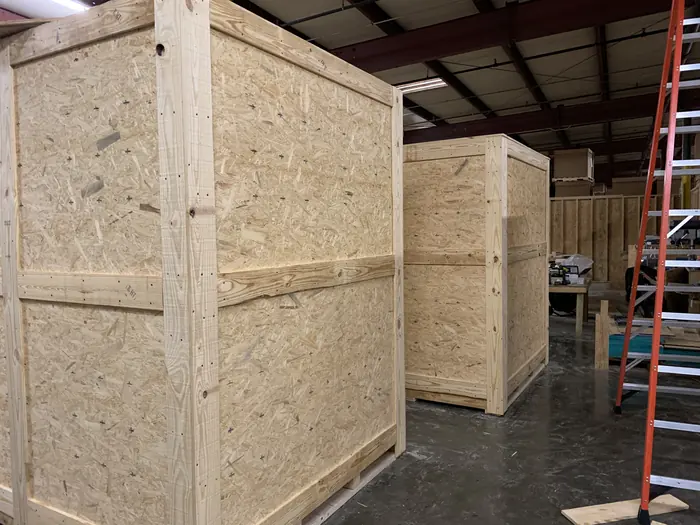 Sheathed crates on the shop floor, built to a customer's packaging spec.