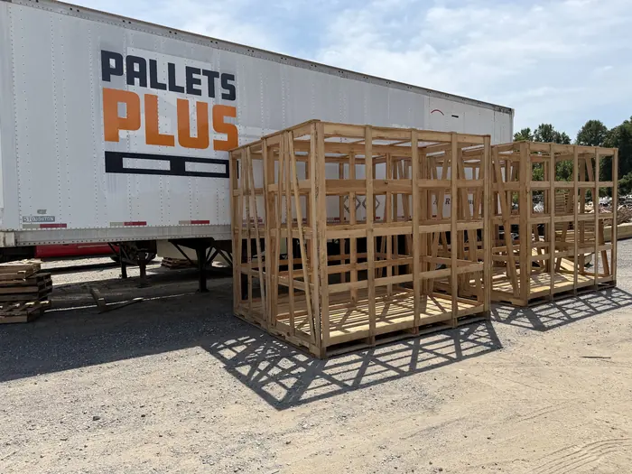 Framed crates staged for pickup in the Clinton yard.