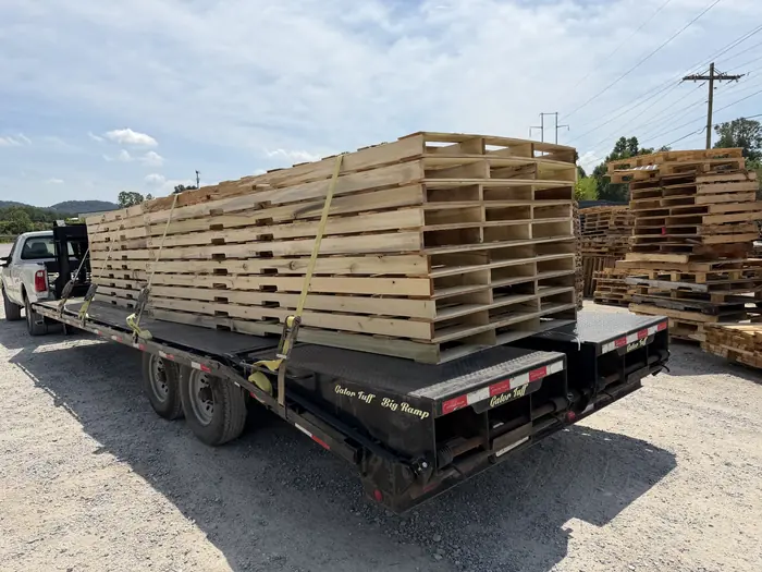 A flatbed strapped and headed out for delivery.