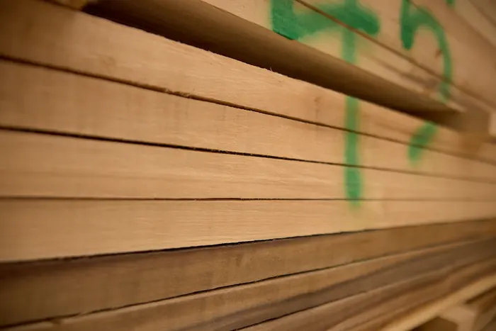 Graded lumber staged for the next run.